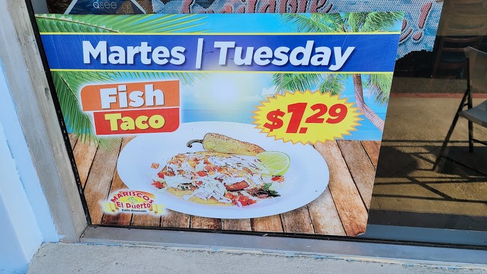 Restaurant menu showing seafood dishes and combinations.